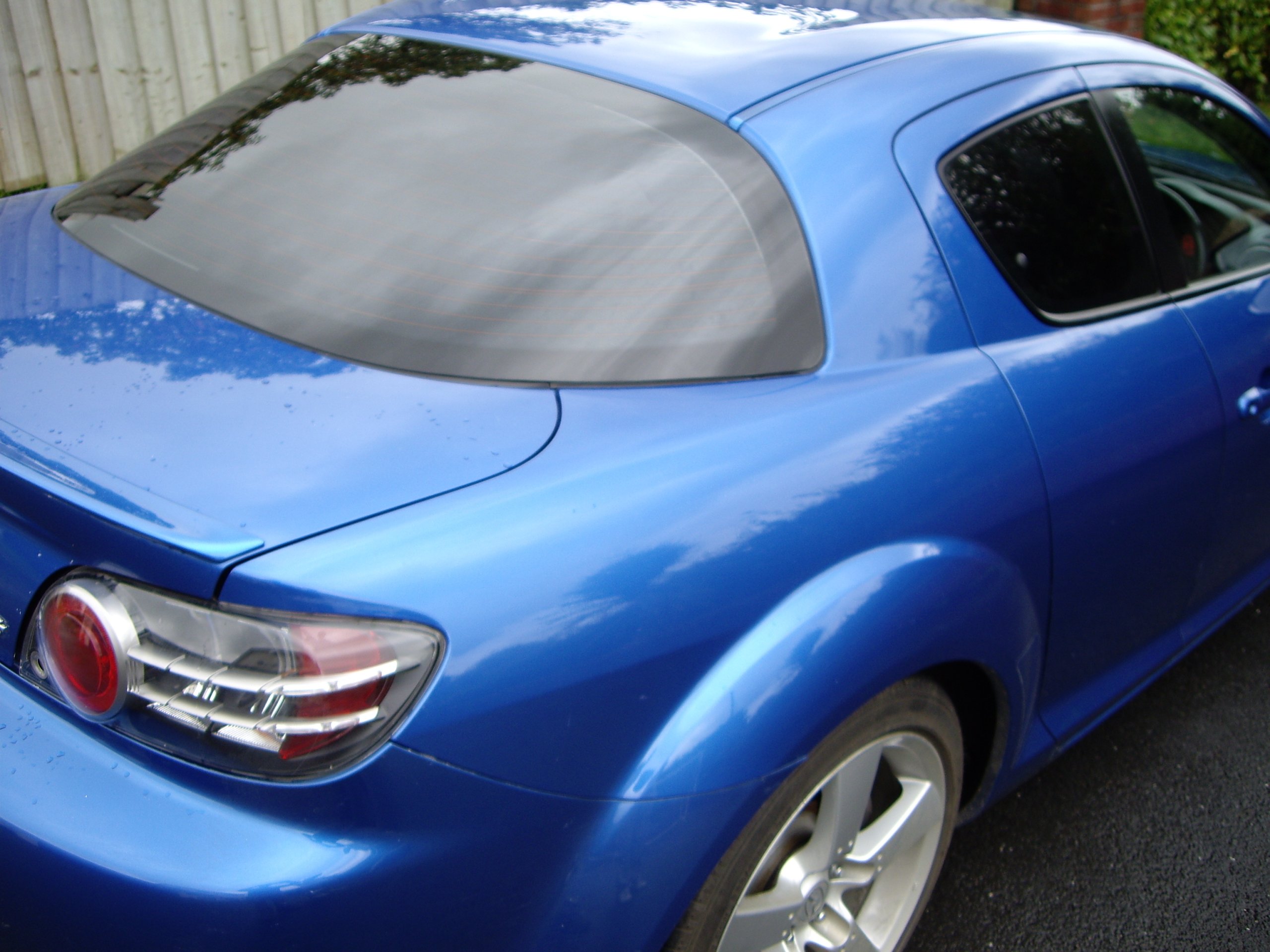 Mazda RX8 limo tint window film application Tinting Express Ltd