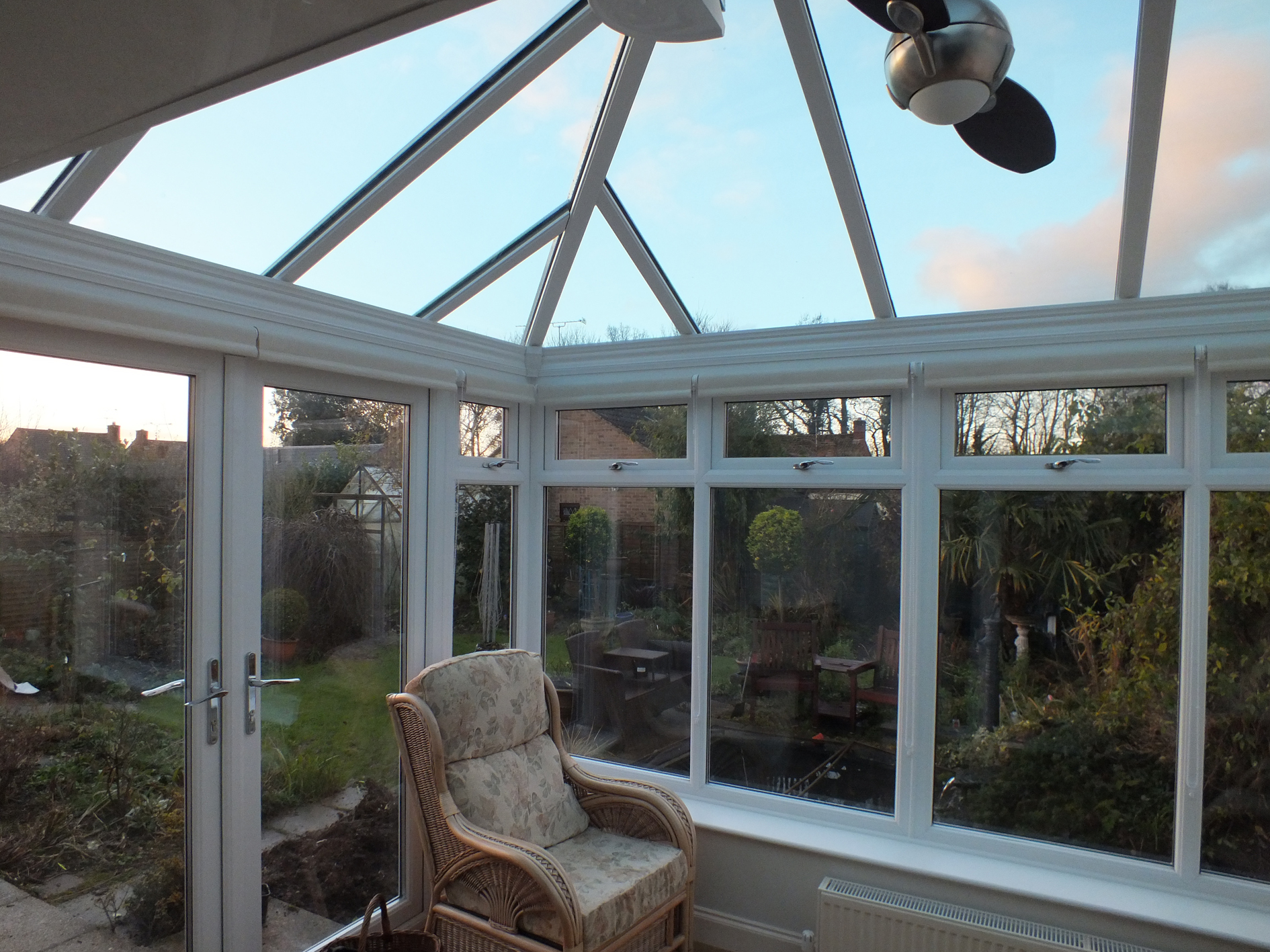 Conservatory roof glass fitted with blue 25 solar window film for glare issues Tinting Express Ltd Barnstaple UK