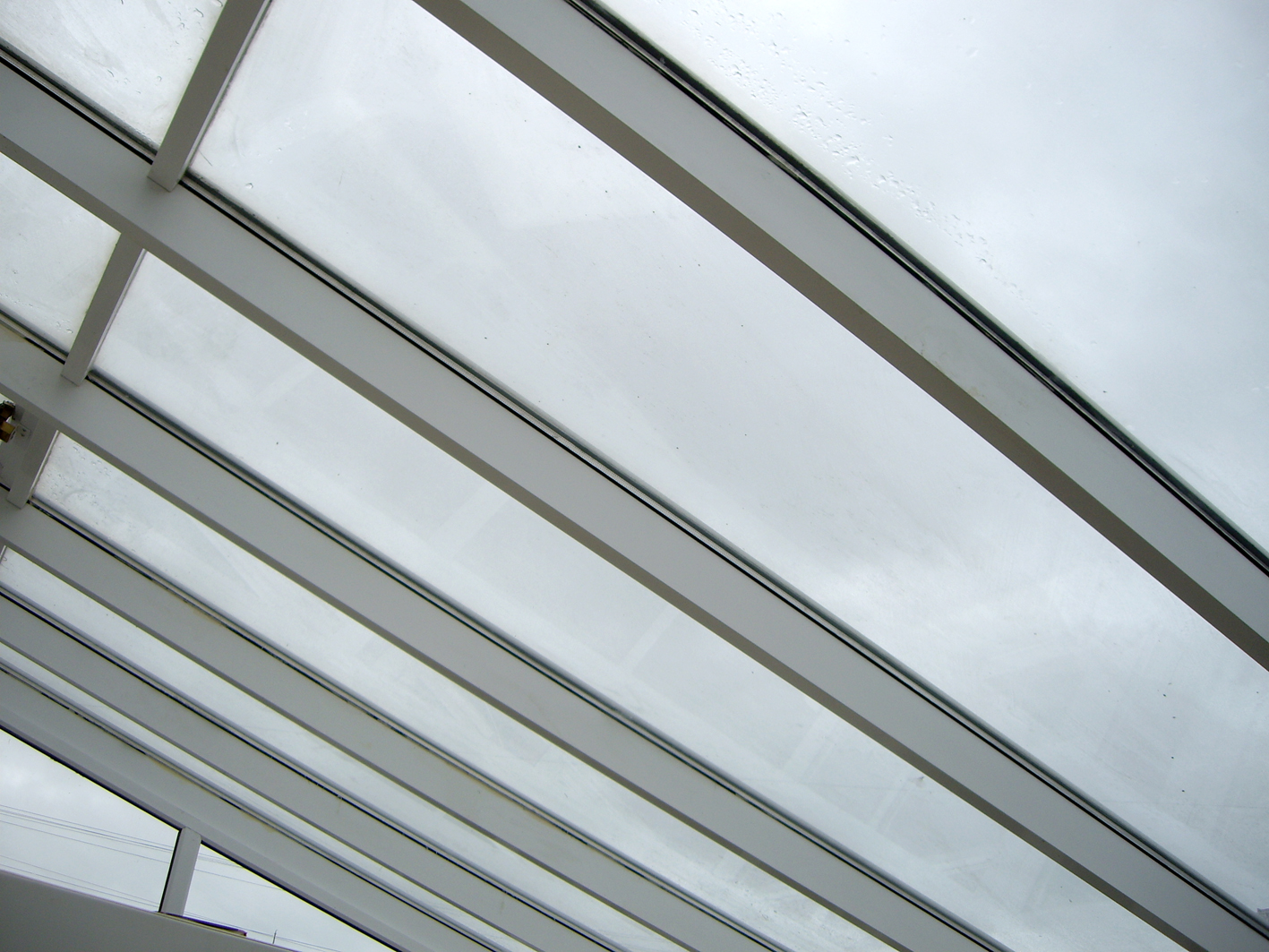 Silver 20 solar window film applied to a large lean-to style conservatory roof Tinting Express Barnstaple Devon