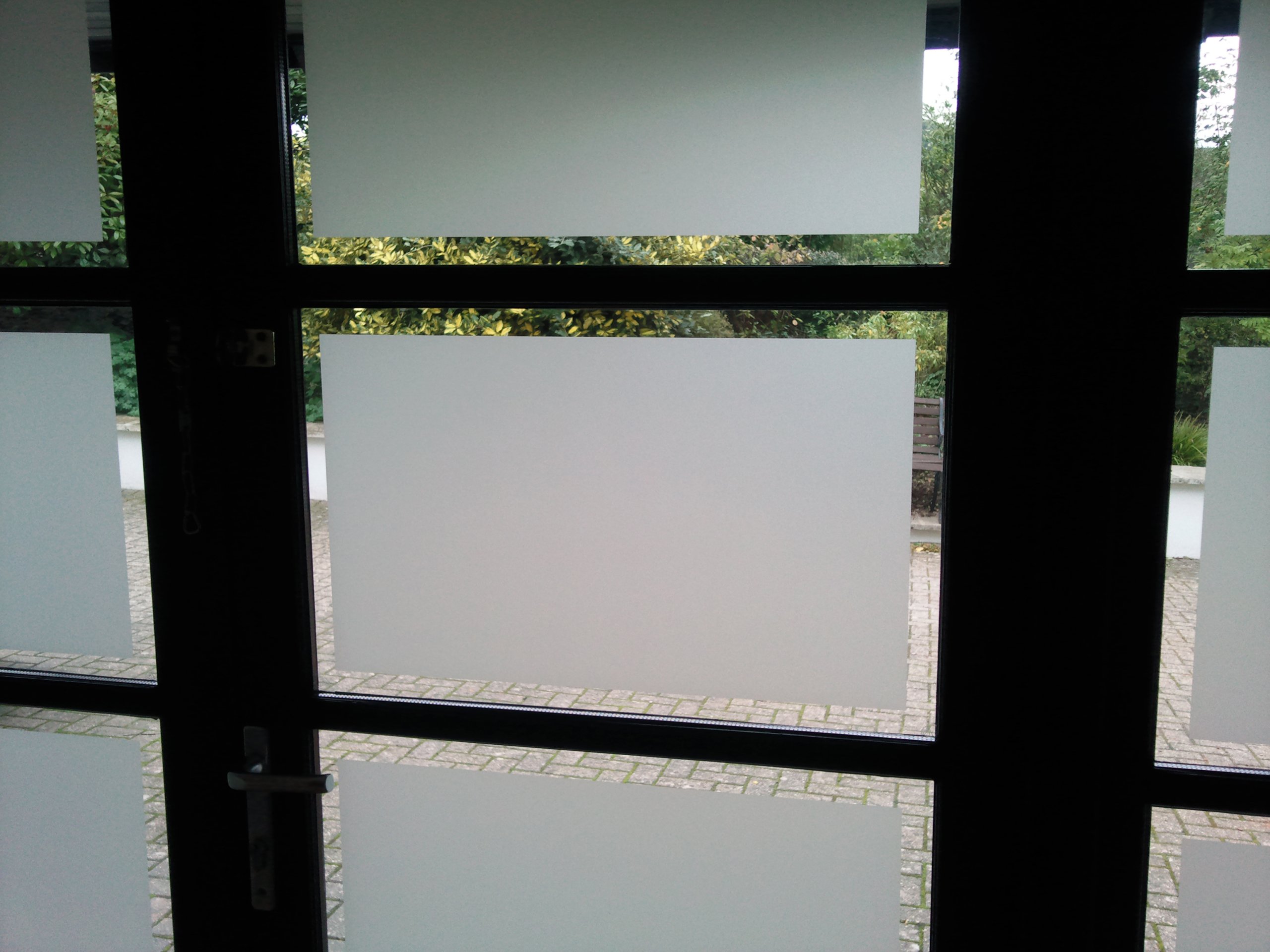 Frosted window film application to doors in Tiverton Devon Tinting Express Ltd