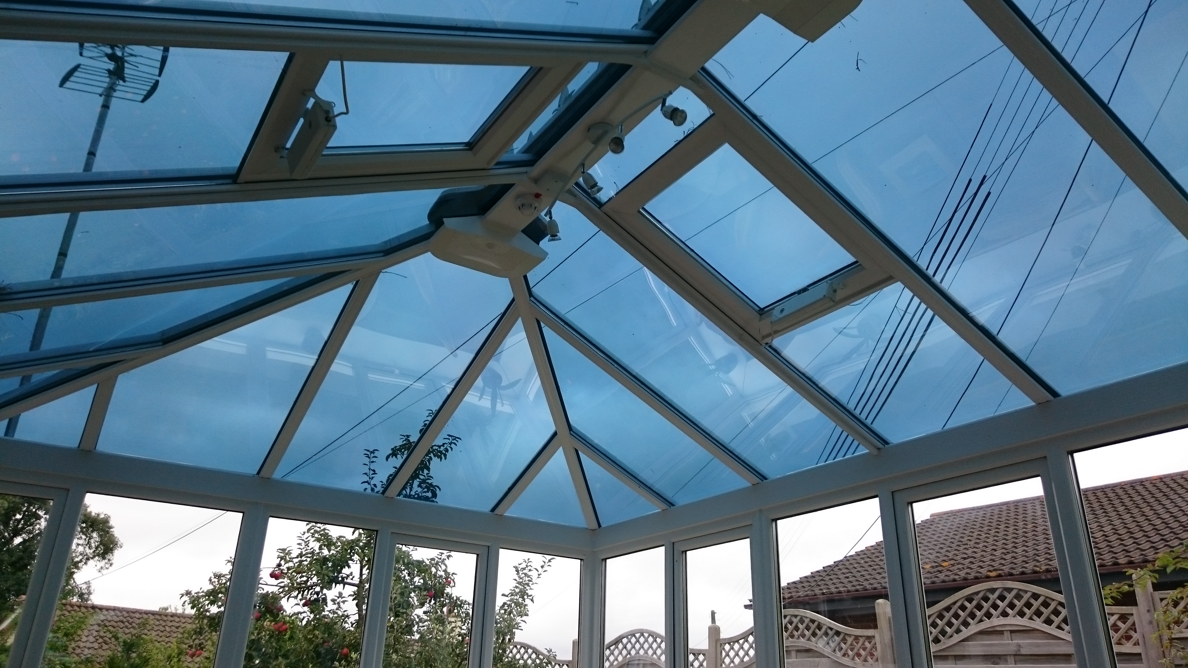 Dual 20V solar window film applied to Active glass conservatory roof by Tinting Express