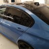 Blue BMW M3 saloon having its carbon roof protected with ppf film. Fitted by our trained Tinting Express fitters in Barnstaple, Devon