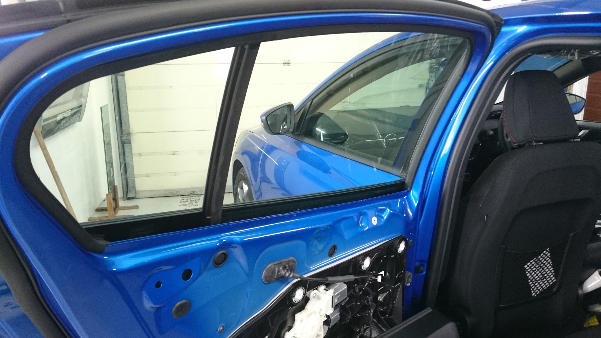 Ford Focus 5 door hatchback door area ready to have window film applied. Tinting Express Barnstaple
