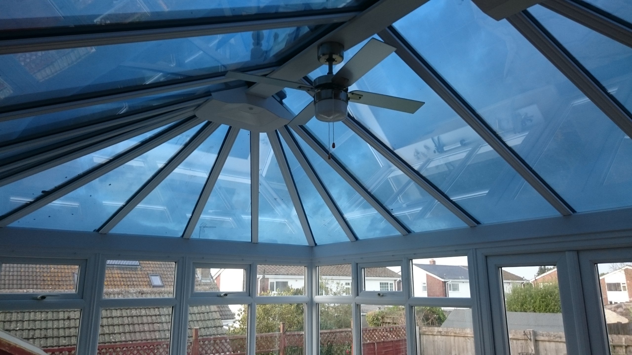 Dual 15 solar window film supplied and fitted to a conservatory roof in Weston-super-Mare. Installation by Tinting Express Barnstaple Devon.