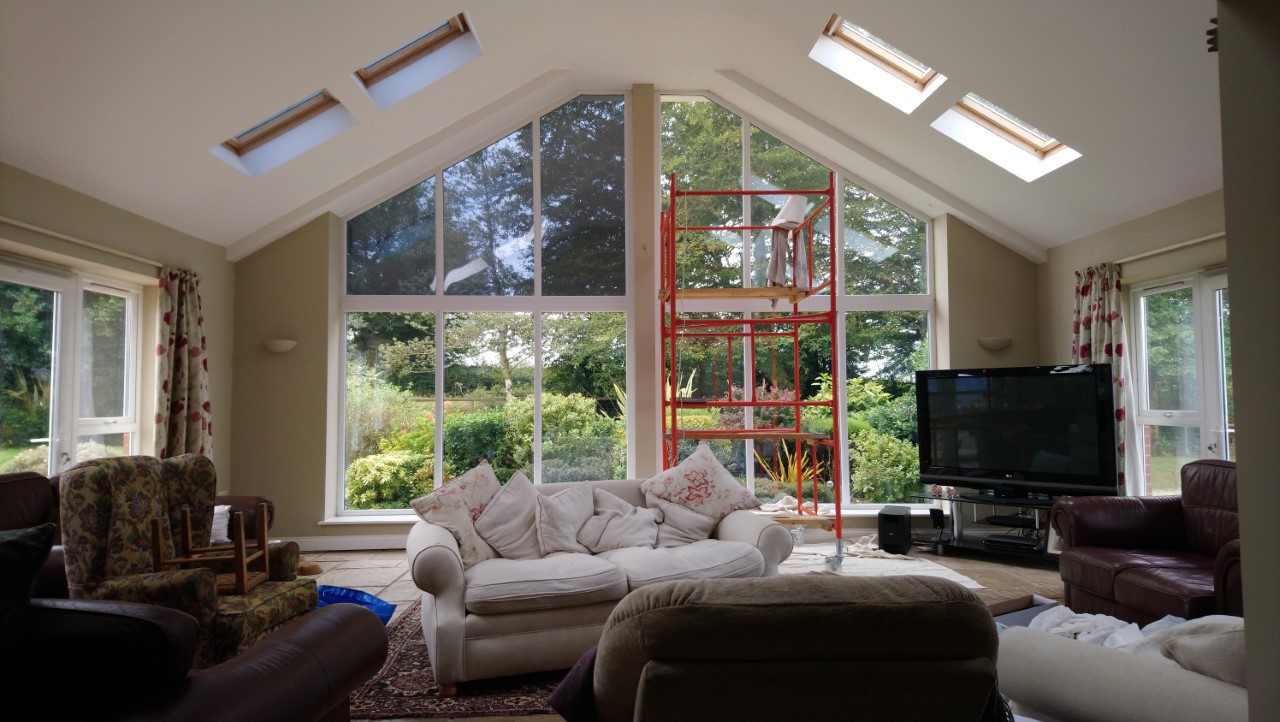 Internal view. Lounge window and velux skylights having a Dual 10 solar window film applied to reduce sunlight glare. Chulmleigh Mid Devon by Tinting Express Ltd Devon