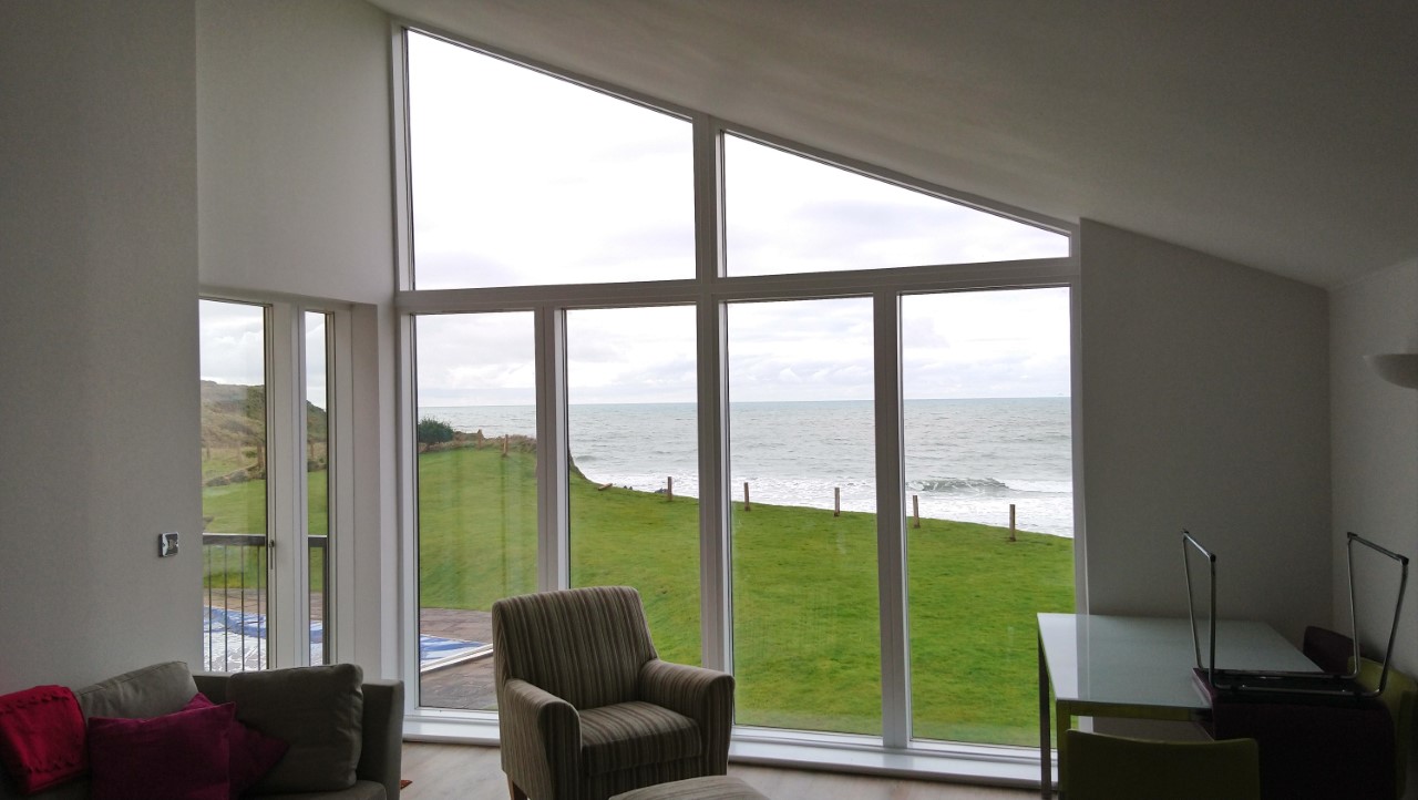 Low Mirror Blue - Light Glare Reduction Film - Gable Window - Thurlestone, South Devon Apartment - Fitted by Tinting Express Ltd