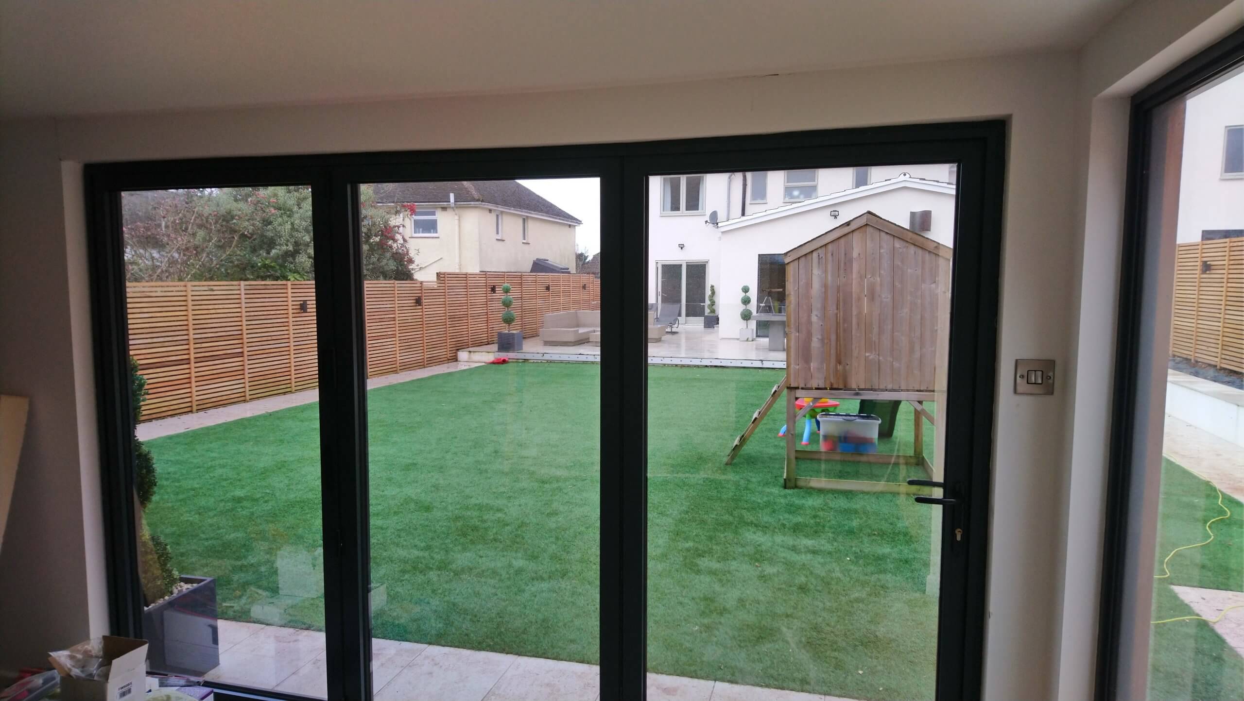 Internal view showing our Natural 40 solar window film applied to a garden room. Whilst creating a shimmer on the glass on the outside with privacy and perfect clarity looking out from the inside. Tinting Express Exeter Devon