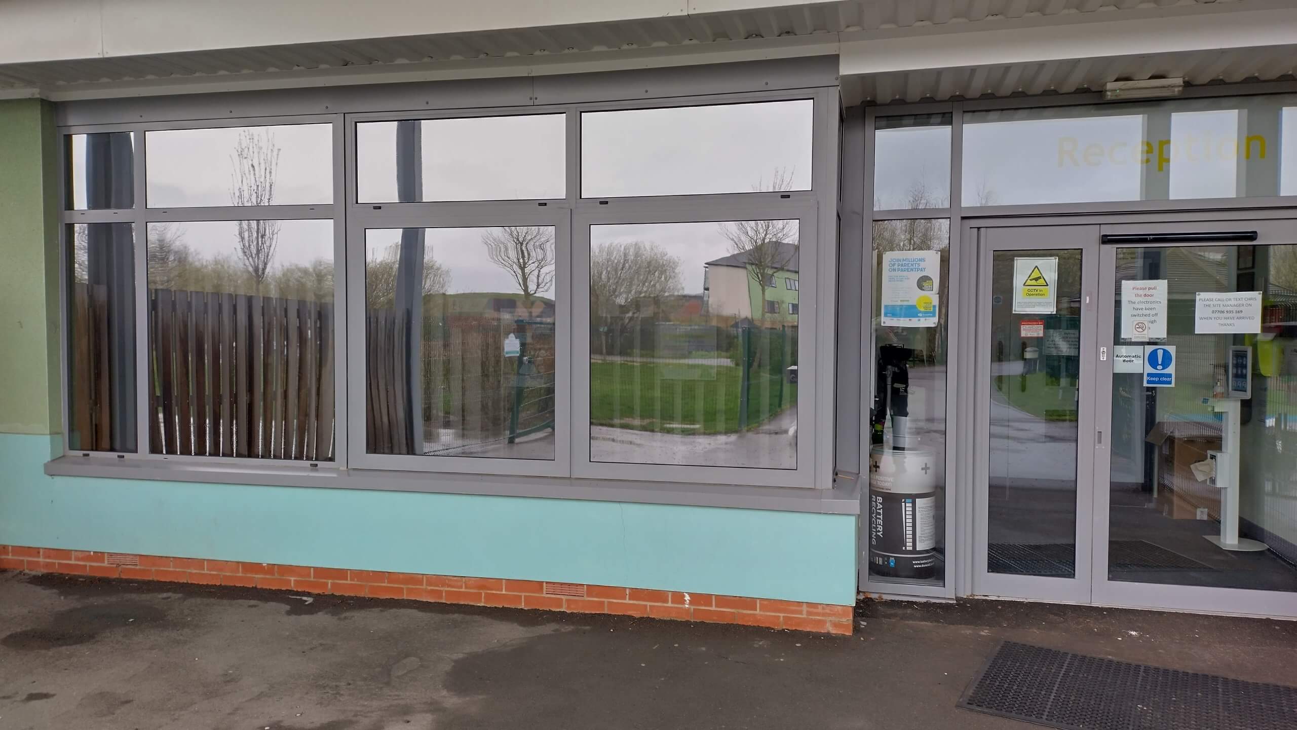 A school in Bridgwater, Somerset. External Grey 20 solar window film applied by Tinting Express, to help control heat and glare in the classrooms along with tidying up the overall look of the building from the playground.