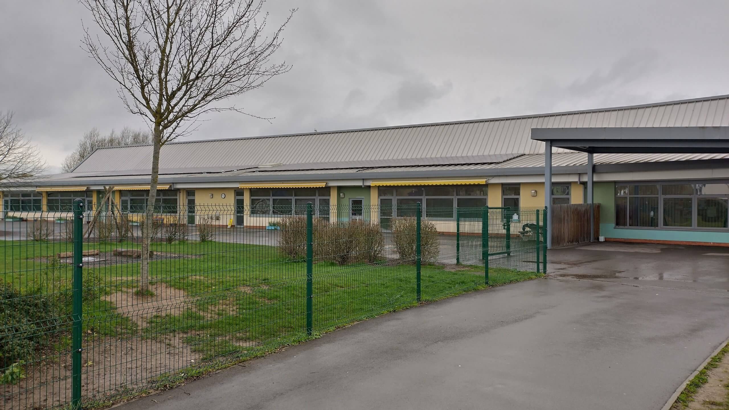 A school in Bridgwater, Somerset. External Grey 20 solar window film applied by Tinting Express, to help control heat and glare in the classrooms along with tidying up the overall look of the building from the playground.