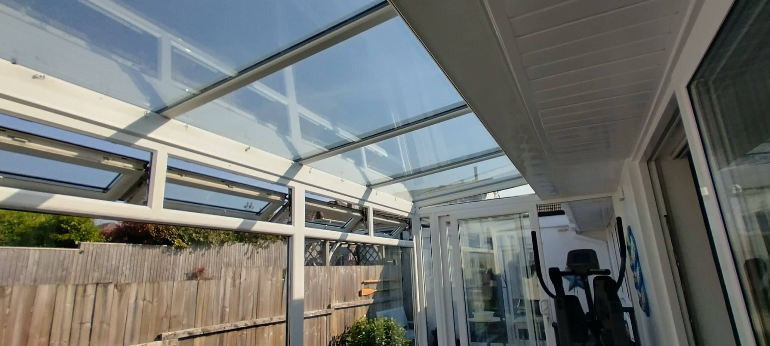 Wembury Plymouth Devon. Lean-to conservatory roof glass fitted with our Dual 15V solar window film. Tinting Express, Devon