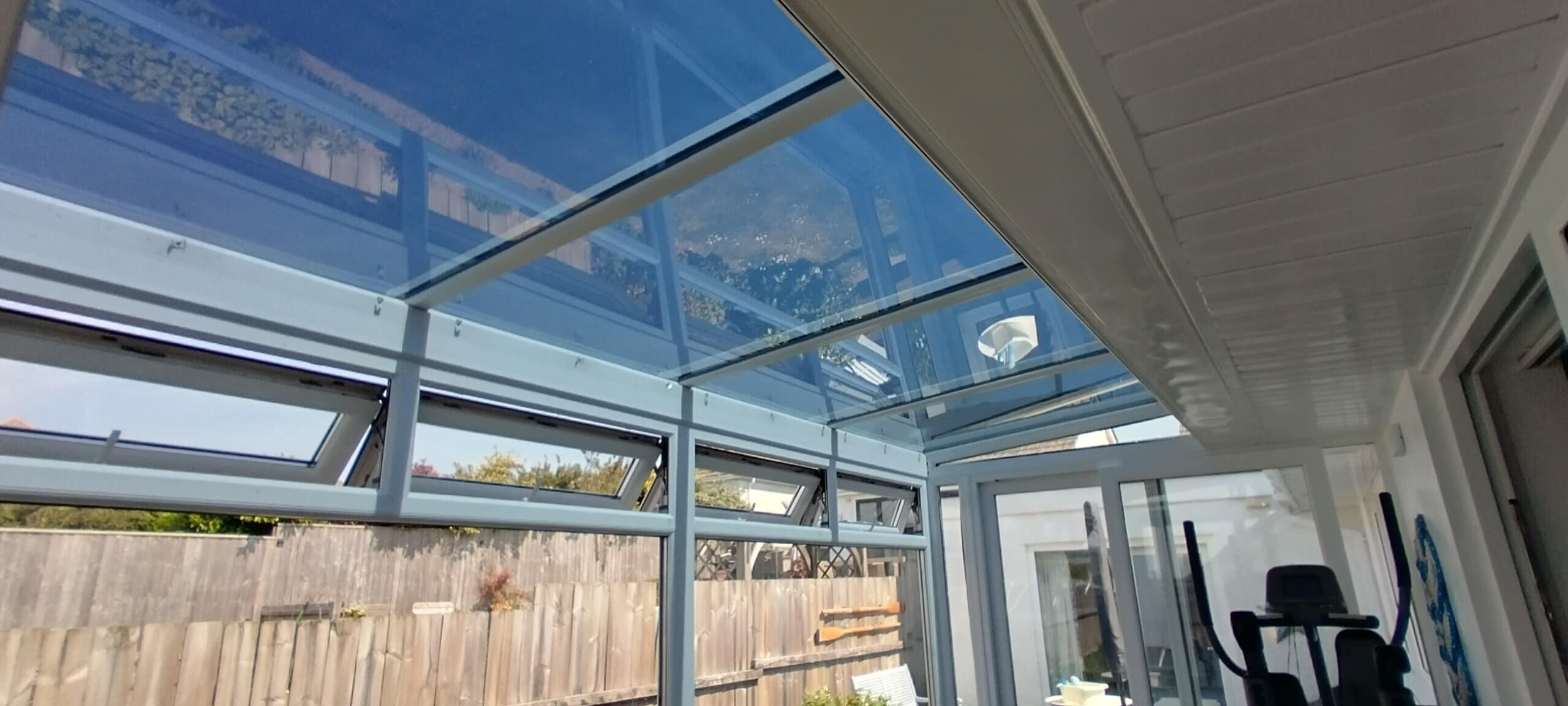 Wembury Plymouth Devon. Lean-to conservatory roof glass fitted with our Dual 15V solar window film. Tinting Express, Devon